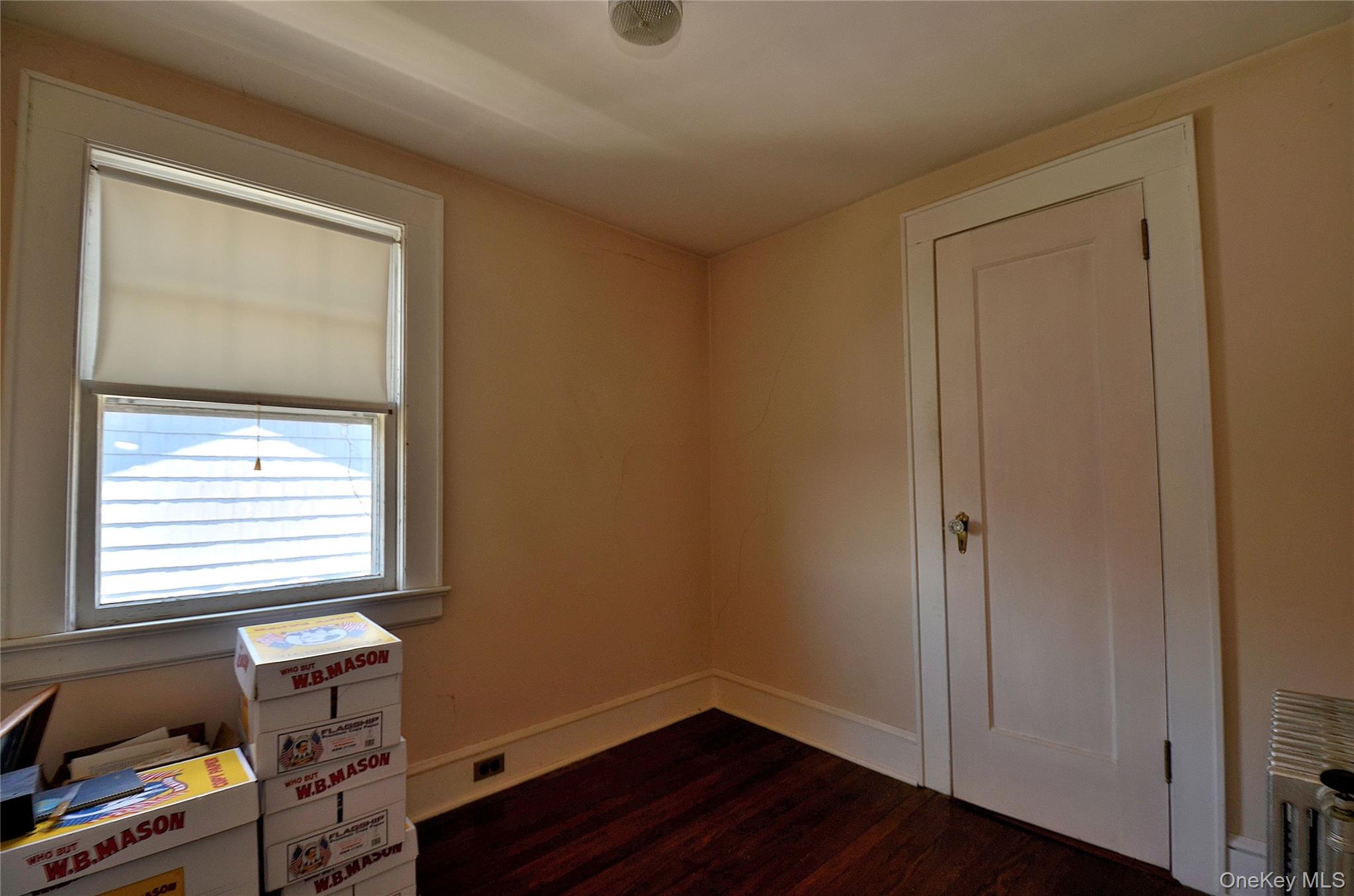 2586 Riverside Drive Wantagh, NY 11793 - Photo 19 of 28 Bedroom featuring hardwood flooring, light-toned walls, white trim