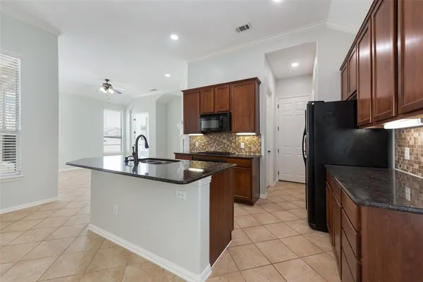 $2,000 | 1128 Spanish Moss Drive, Savannah, TX 76227