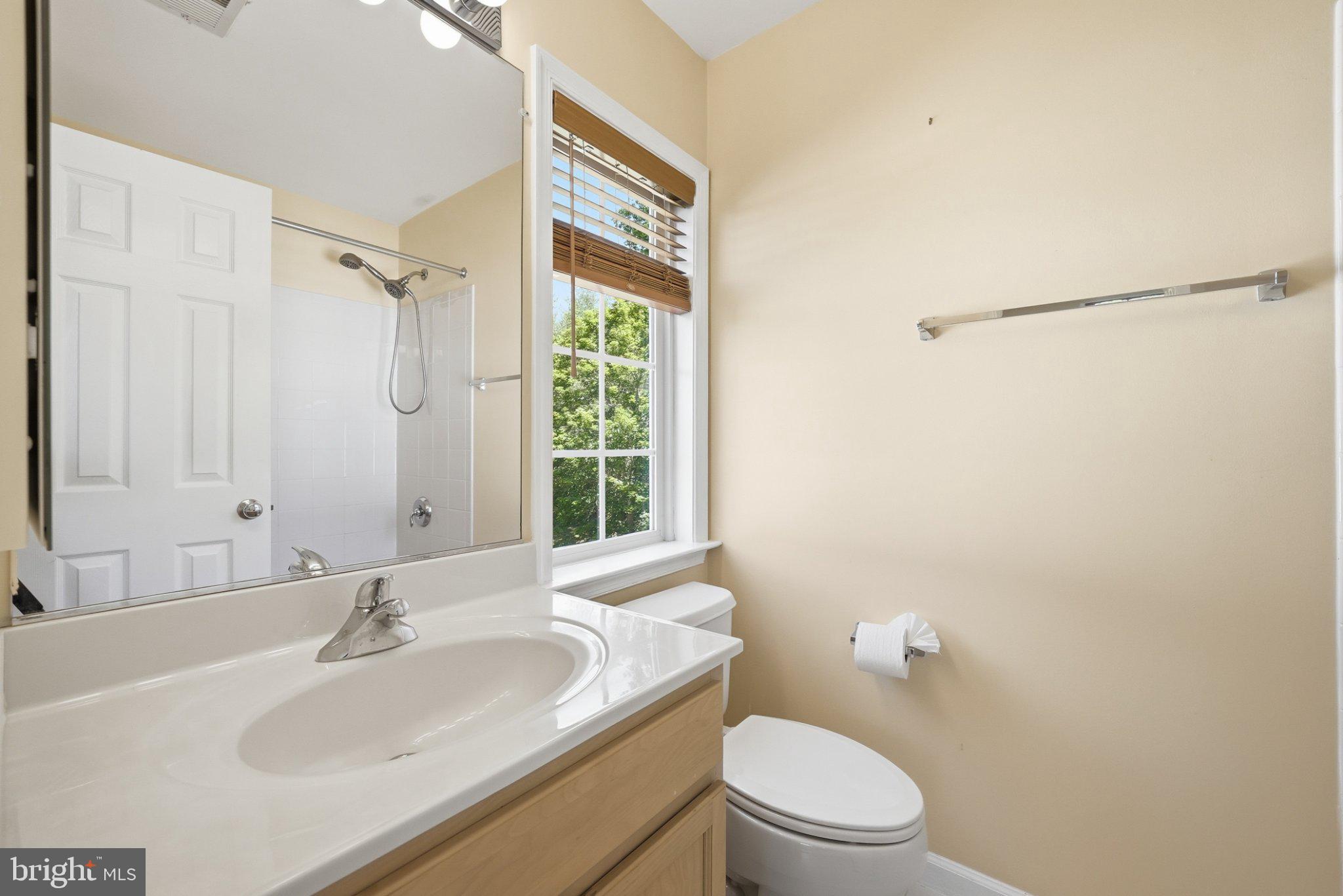 3679 Expedition Drive Triangle, VA 22172 - Photo 39 of 65 a bathroom with a sink toilet and shower