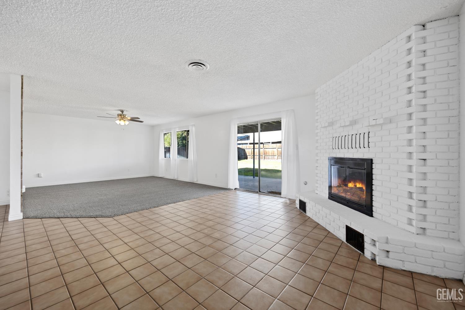 Undisclosed Address Bakersfield, CA 93312 - Photo 14 of 30 a view of an empty room and window