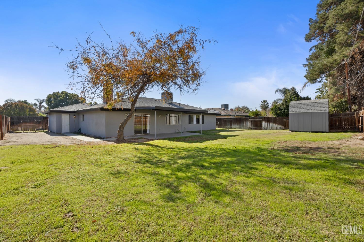 Undisclosed Address Bakersfield, CA 93312 - Photo 30 of 30 a front view of a house with a yard