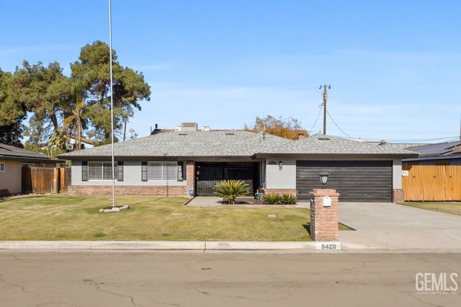 Undisclosed Address Bakersfield, CA 93312 - Photo 3 of 30 a front view of a house with a ocean view