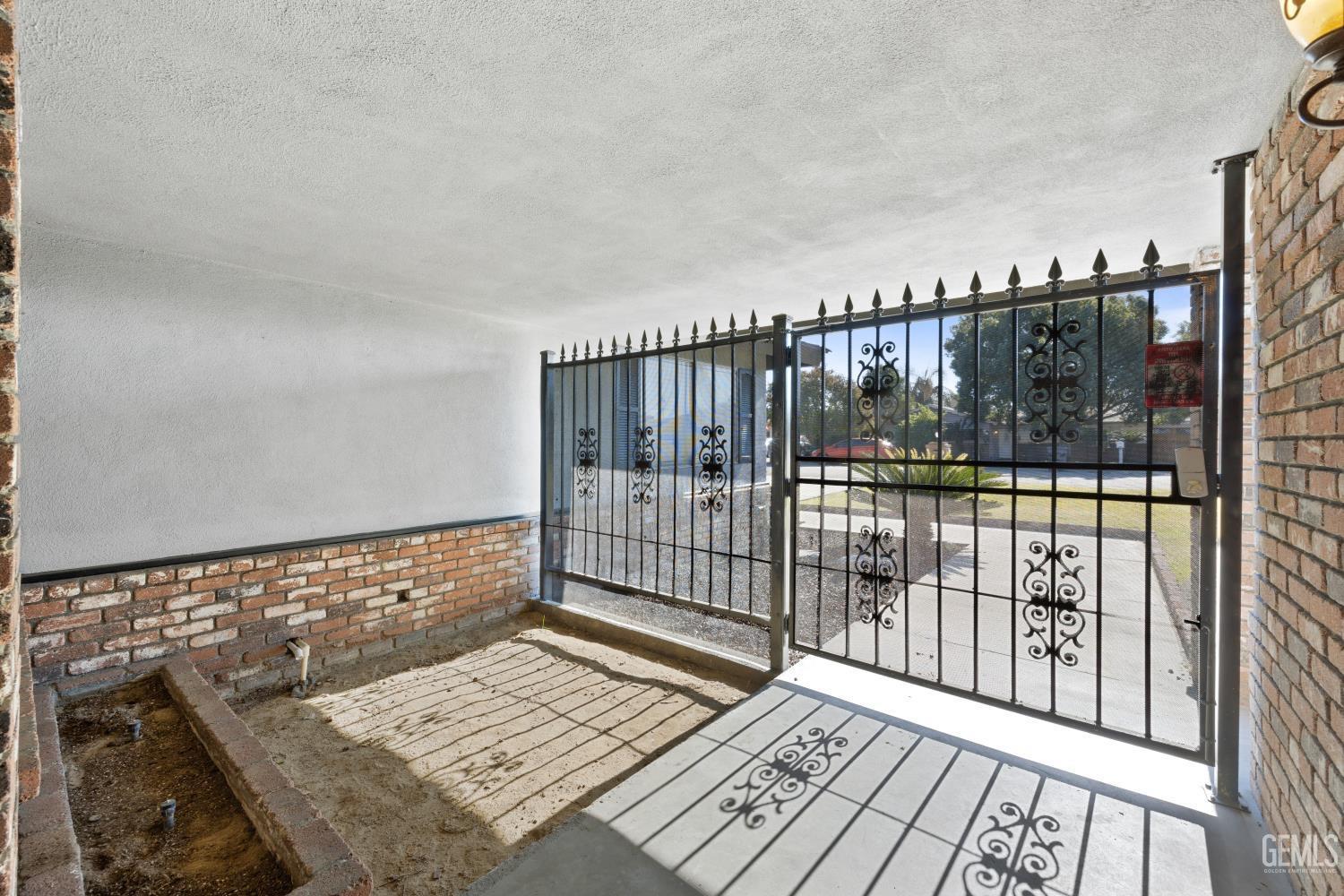 Undisclosed Address Bakersfield, CA 93312 - Photo 5 of 30 a view of a balcony with wooden floor