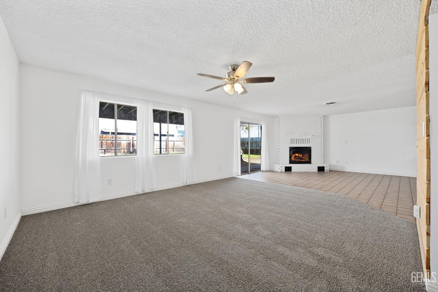 Undisclosed Address Bakersfield, CA 93312 - Photo 10 of 30 a view of an empty room with a window