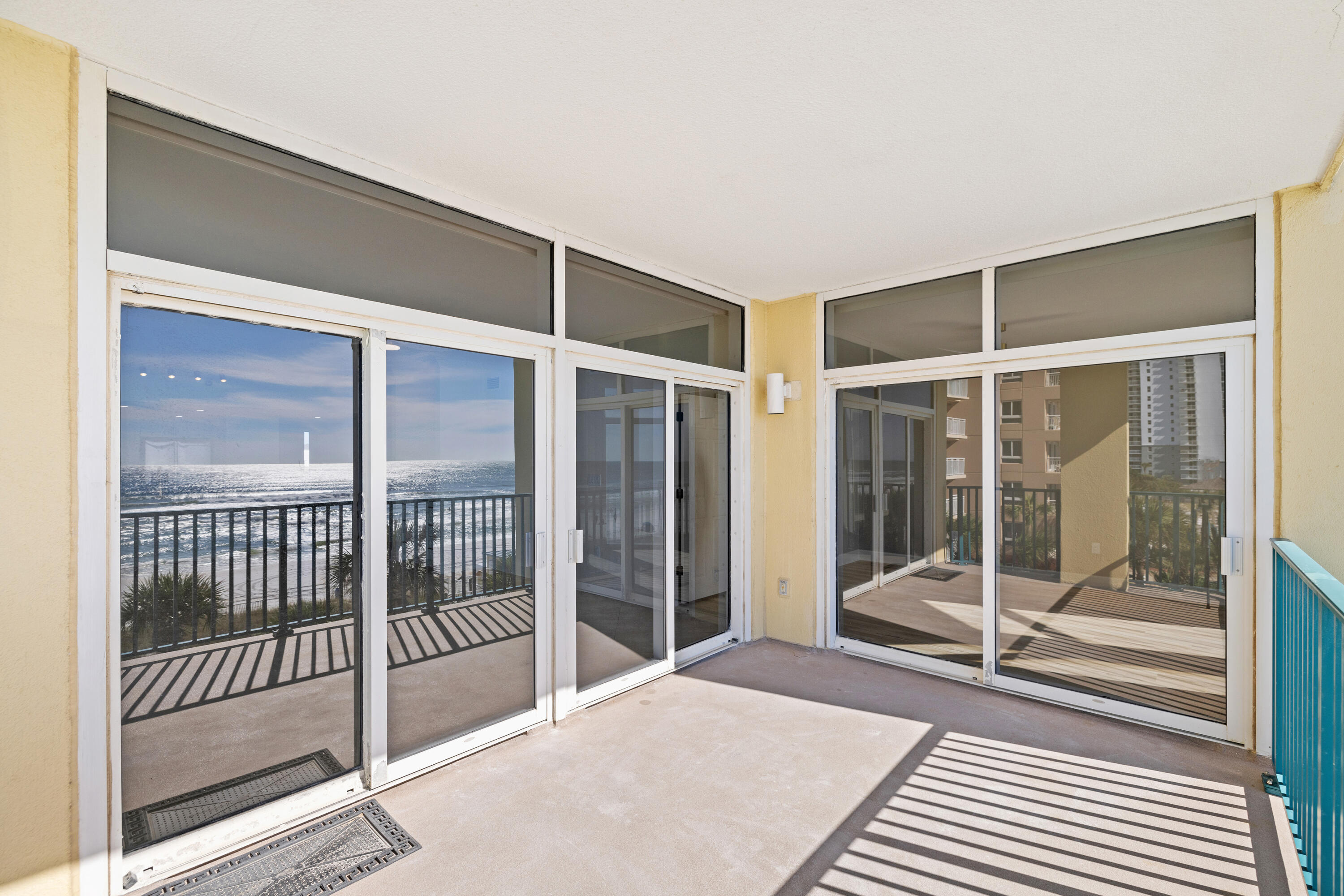 1018 Highway 98, Unit 340 Destin, FL 32541 - Photo 11 of 62 a bedroom with sliding door and a balcony