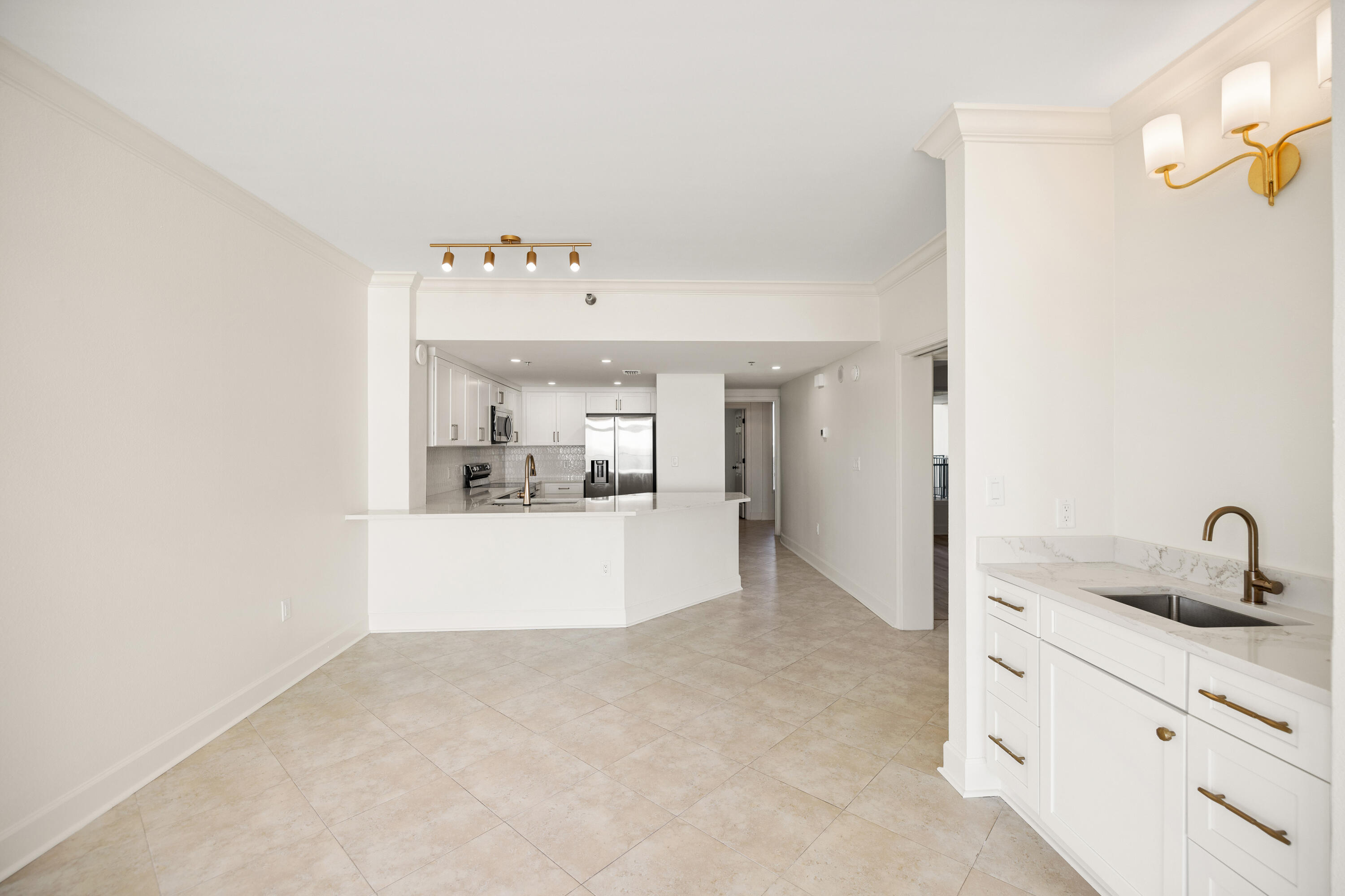 1018 Highway 98, Unit 340 Destin, FL 32541 - Photo 14 of 62 a bathroom with a sink a mirror and shower