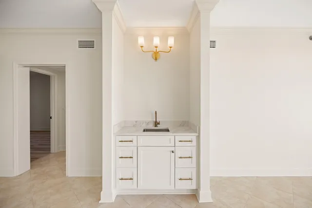 a kitchen with a refrigerator stove and microwave