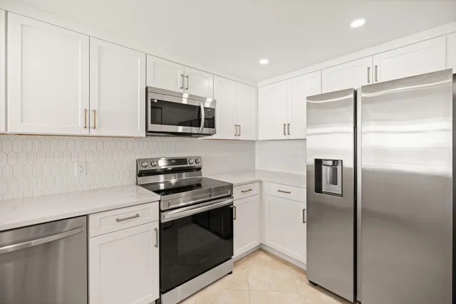 a kitchen with a sink and a microwave