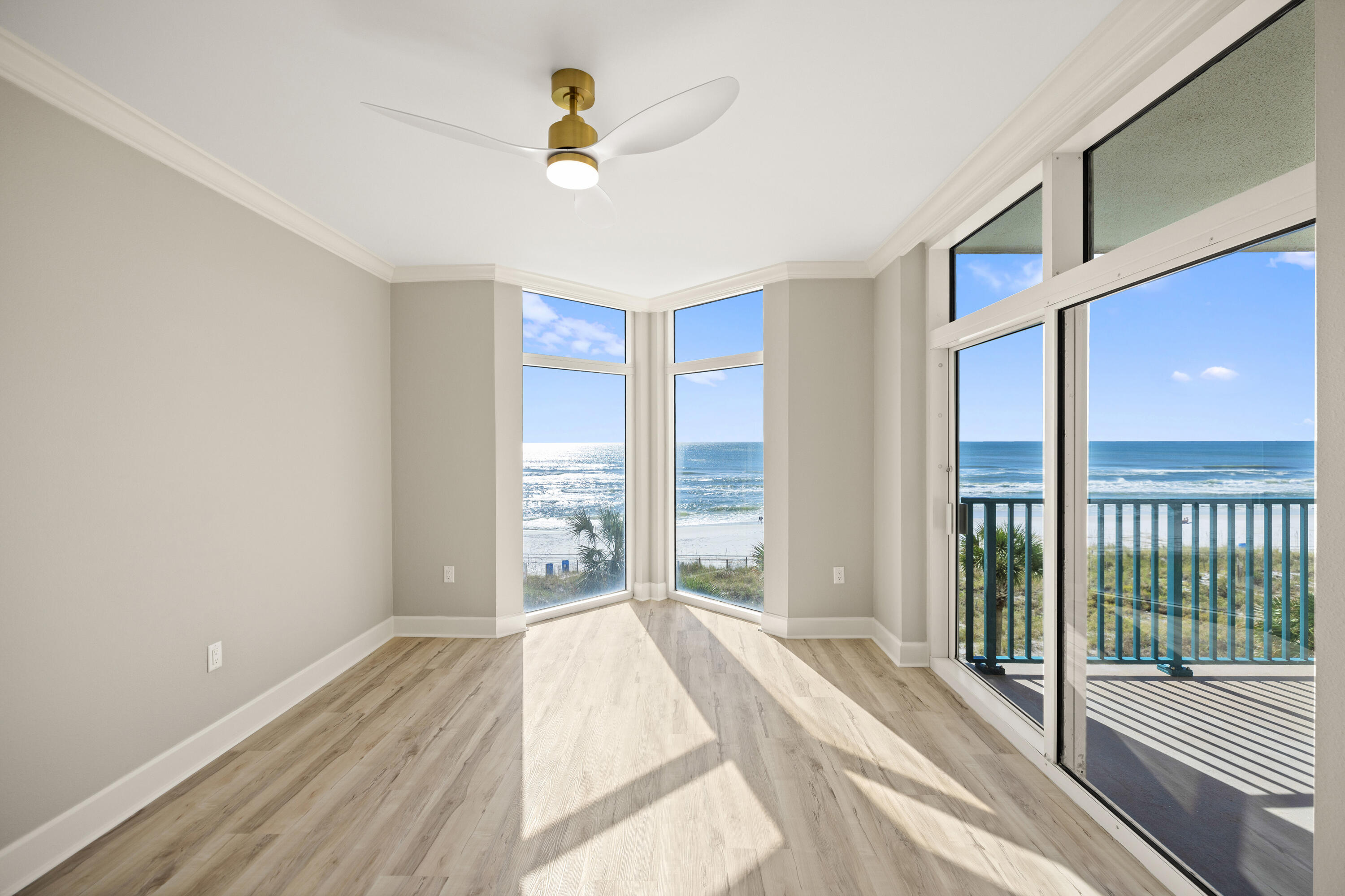 1018 Highway 98, Unit 340 Destin, FL 32541 - Photo 26 of 62 a view of a bedroom with wooden floor and a window