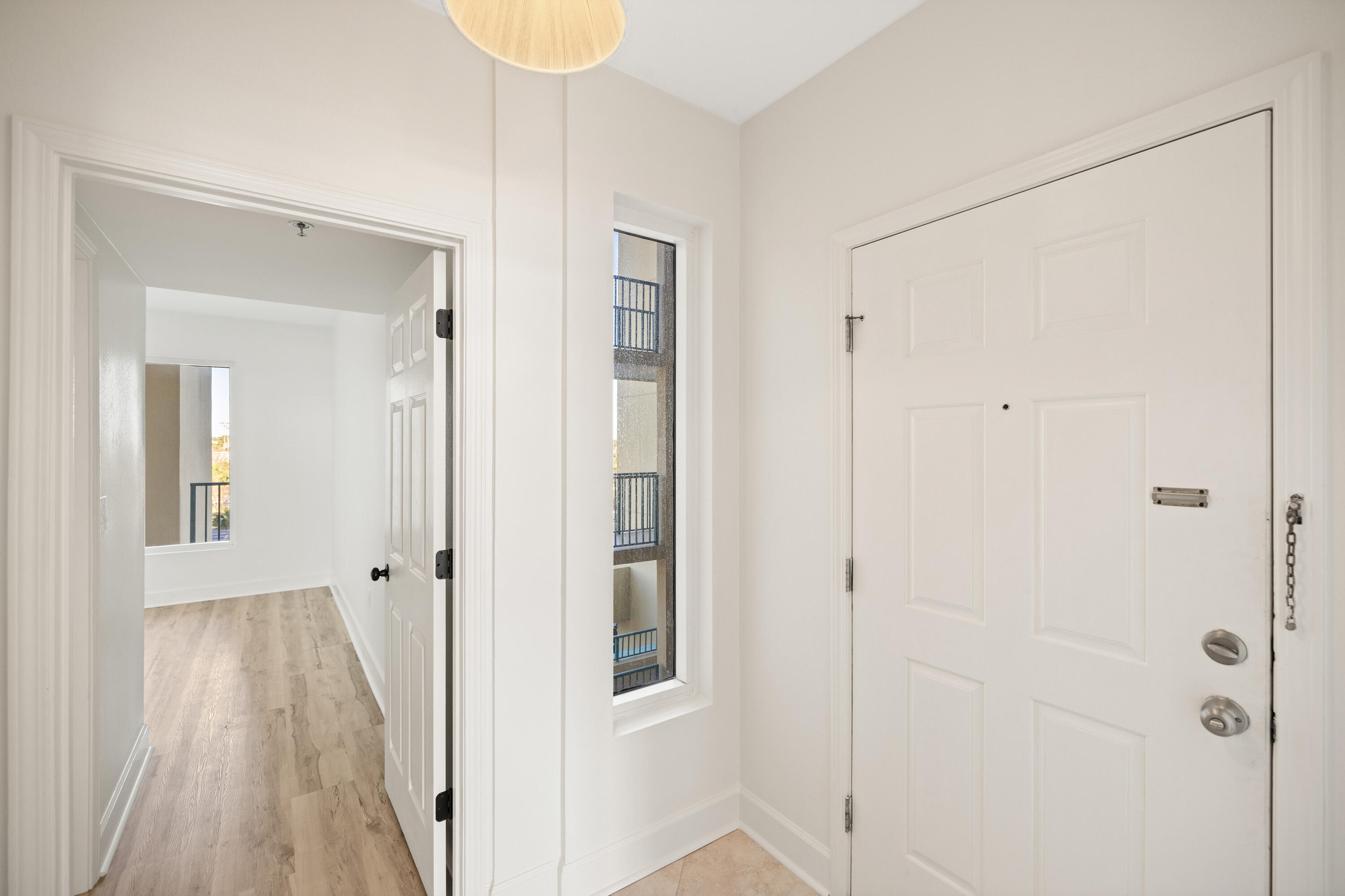 1018 Highway 98, Unit 340 Destin, FL 32541 - Photo 31 of 62 a view of a bathroom with a sink and a mirror