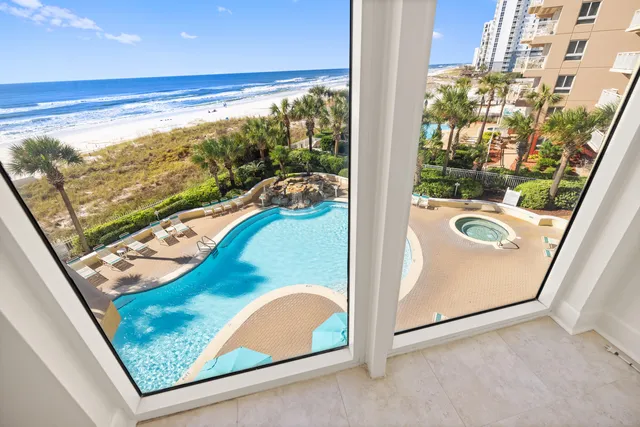 a view of empty room with floor to ceiling window