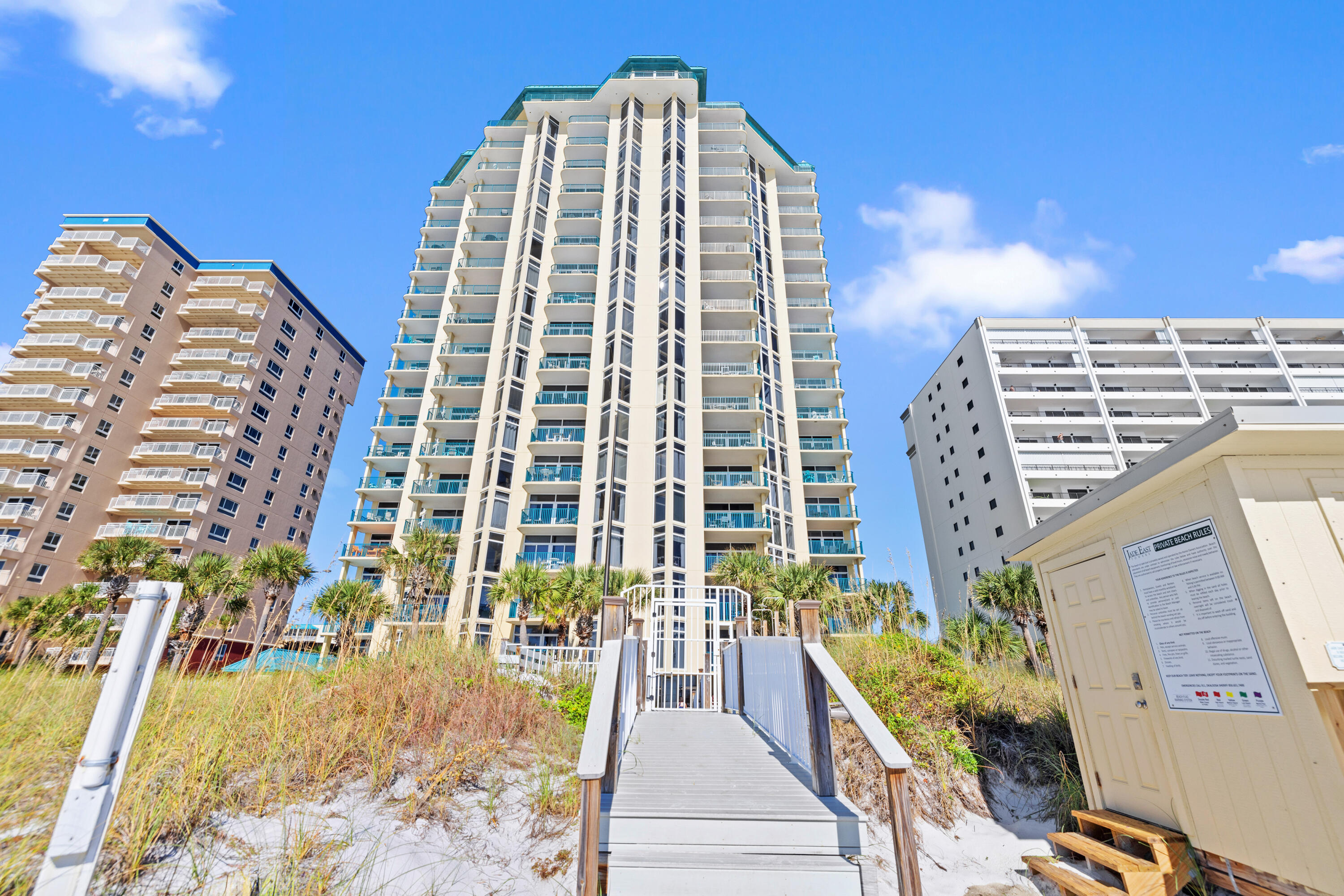 1018 Highway 98, Unit 340 Destin, FL 32541 - Photo 49 of 62 a view of a large building with a yard
