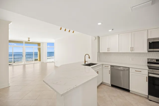 a view of balcony with wooden floor