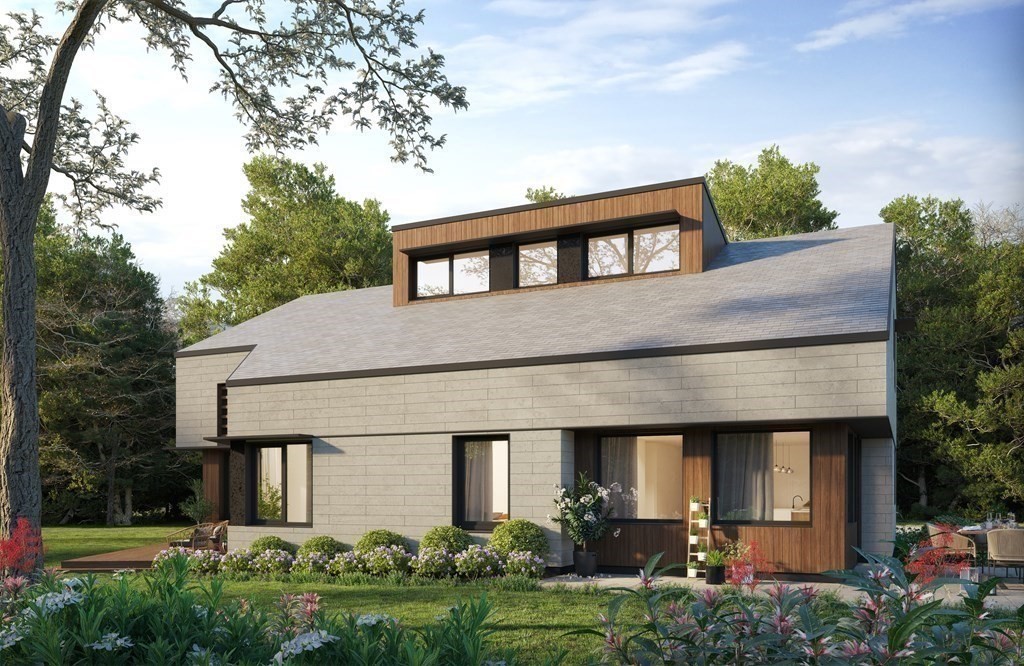 4 Eagle Rock Road Stoughton, MA 02072 - Photo 1 of 12 a front view of a house with garden