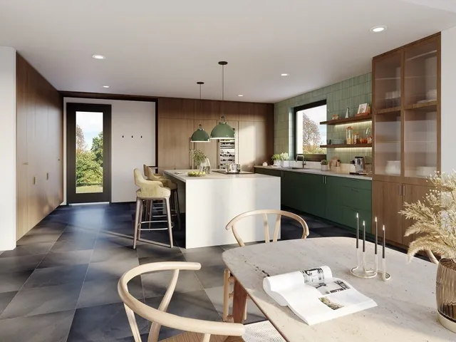 a kitchen with kitchen island a stove a sink a refrigerator dining table and chairs