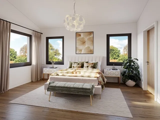 a bedroom with a bed and a chandelier