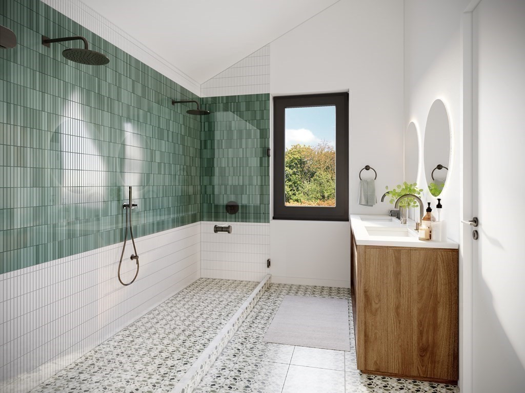 4 Eagle Rock Road Stoughton, MA 02072 - Photo 9 of 12 a bathroom with a tub sink and mirror