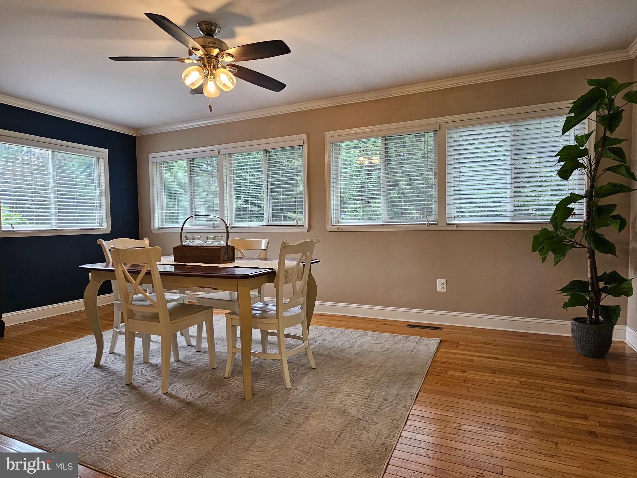 319 Wye Road Queenstown, MD 21658 - Photo 12 of 29 a view of a dining room with furniture window and outside view
