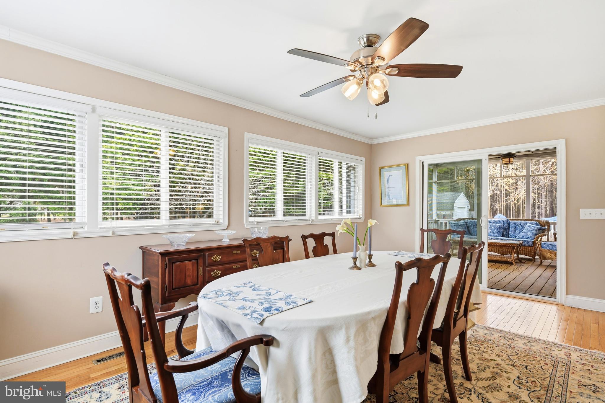 319 Wye Road Queenstown, MD 21658 - Photo 13 of 29 a view of a dining room with furniture window and outside view
