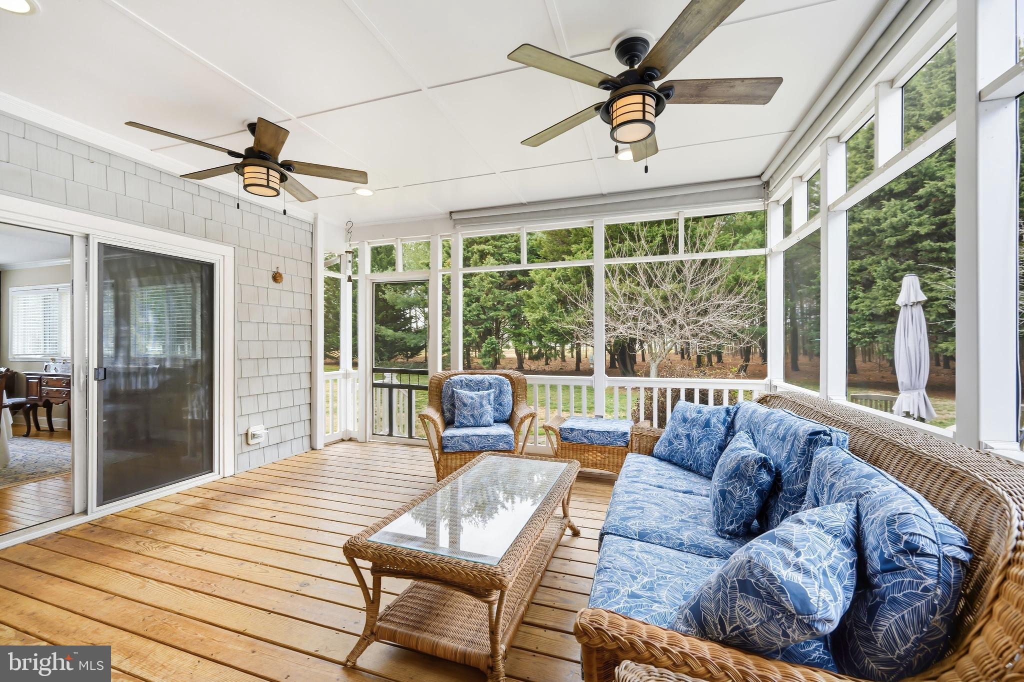 319 Wye Road Queenstown, MD 21658 - Photo 14 of 29 a living room with furniture and a large window