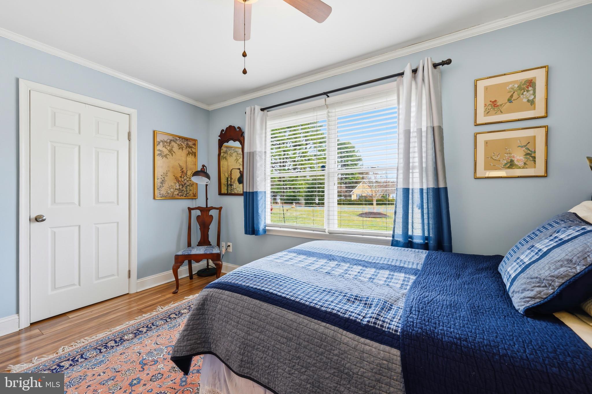 319 Wye Road Queenstown, MD 21658 - Photo 24 of 29 a bedroom with a bed and a window