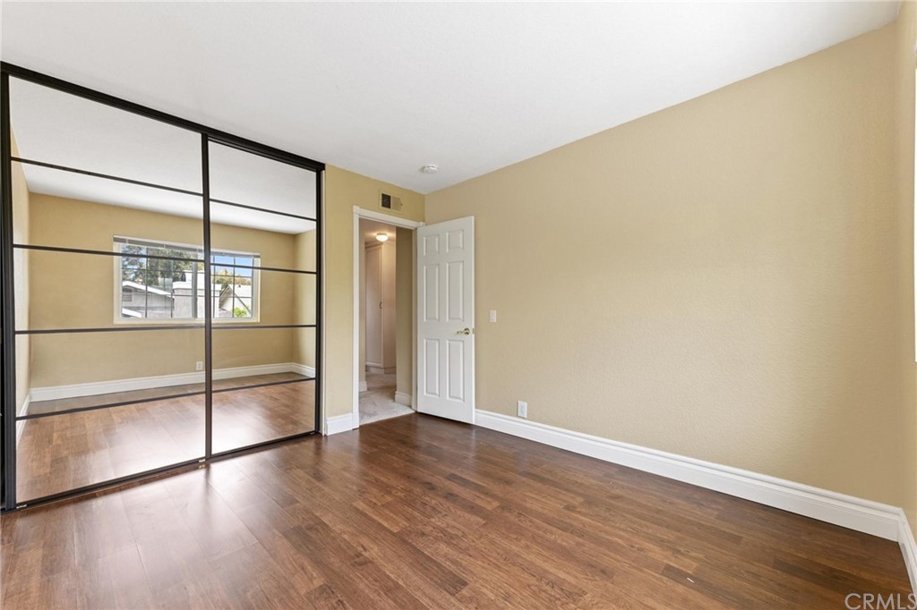17 Leesburg Irvine, CA 92620 - Photo 19 of 48 Bedroom #2 Floor to ceiling Custom Mirrored closet doors.