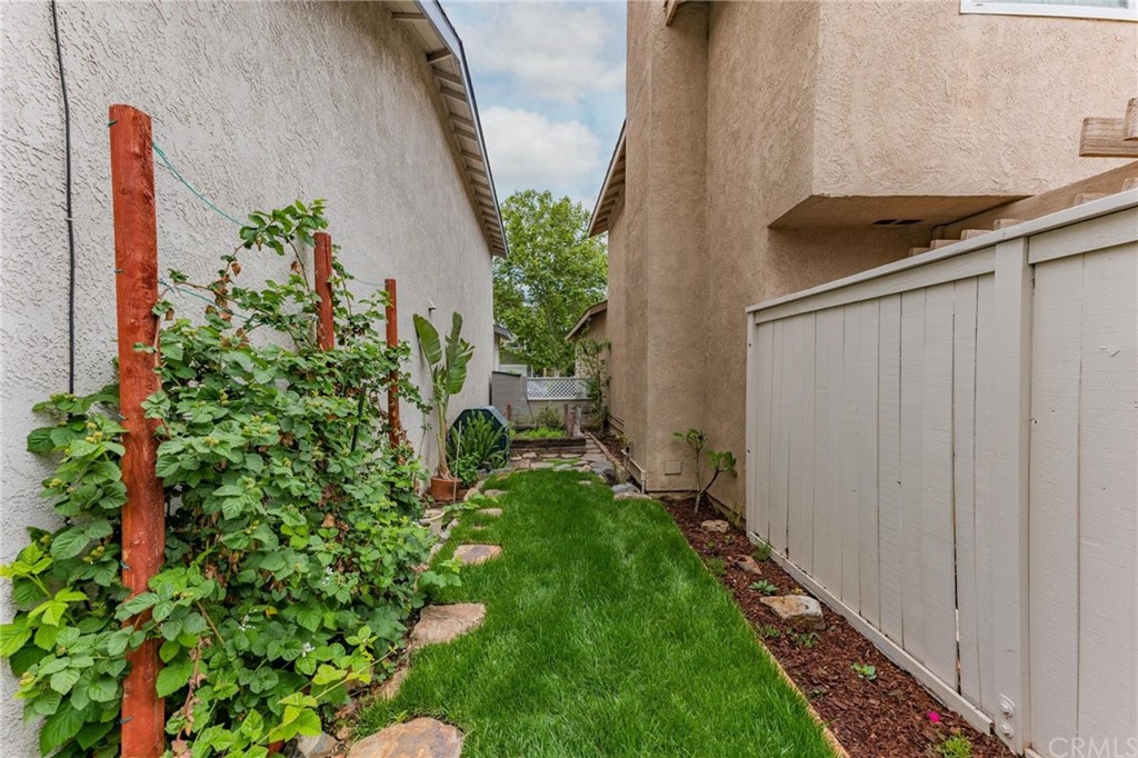 17 Leesburg Irvine, CA 92620 - Photo 35 of 48 Back side yard, with therapeutic garden with raised beds and berry vines.