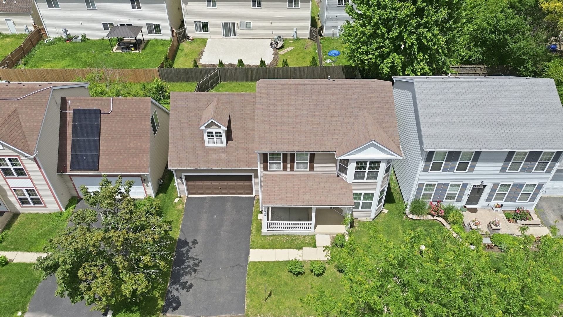 1758 Edith Lane Aurora, IL 60504 - Photo 3 of 28 an aerial view of a house with a yard and plants
