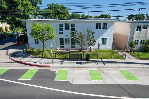 a view of a chairs and table in the patio