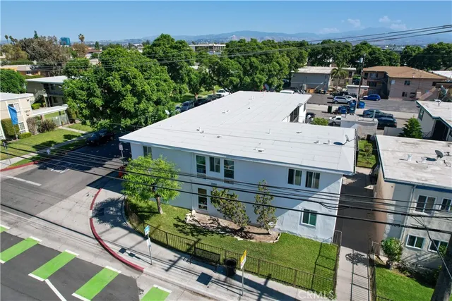 an aerial view of a house with a garden