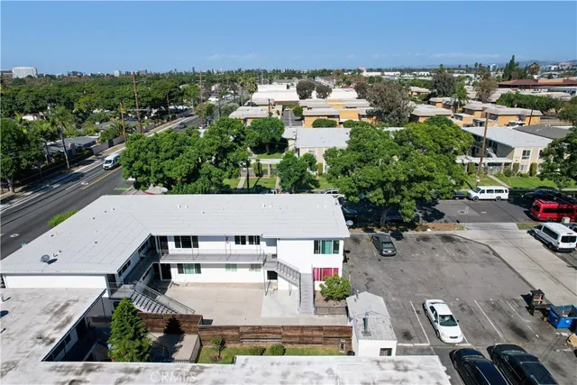 an aerial view of a house with a garden