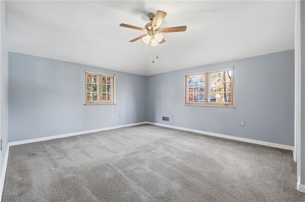 419 Burlington Road Pittsburgh, PA 15221 - Photo 21 of 38 a view of an empty room with a window