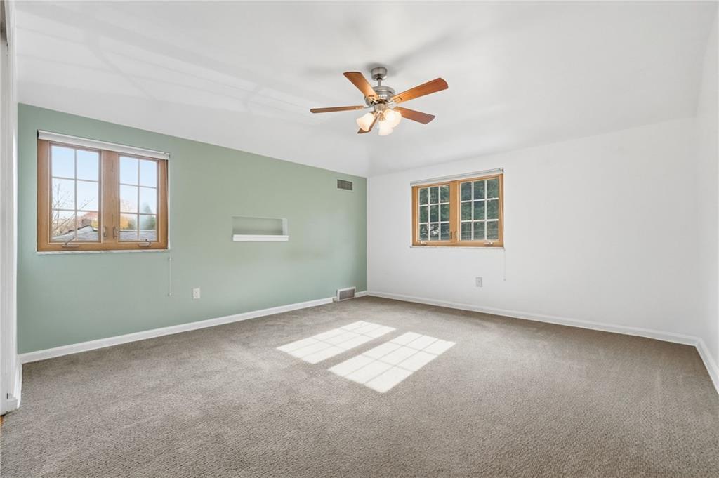 419 Burlington Road Pittsburgh, PA 15221 - Photo 23 of 38 a view of an empty room with a window