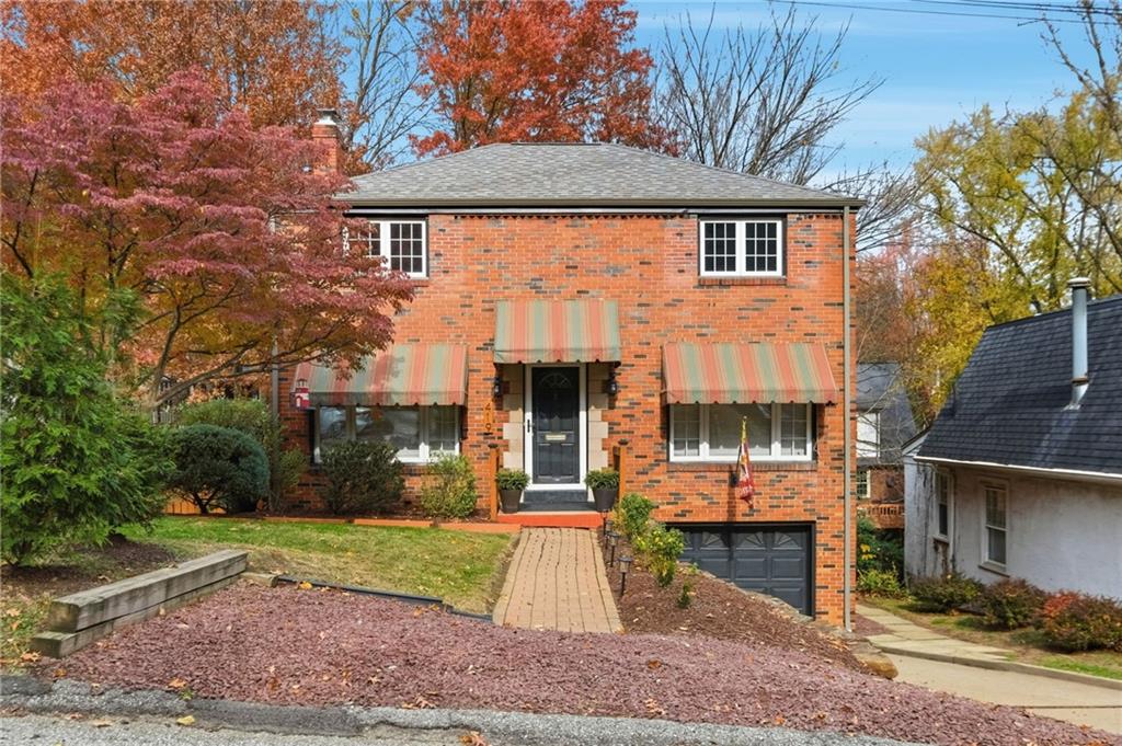 419 Burlington Road Pittsburgh, PA 15221 - Photo 33 of 38 a front view of a house with garden