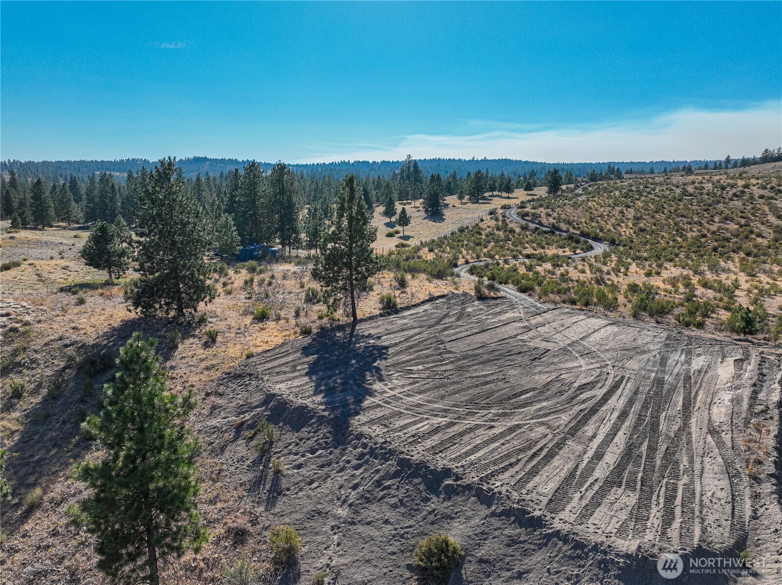0 Evergreen Camp Road Chelan, WA 98816 - Photo 4 of 21 a view of a backyard of the house