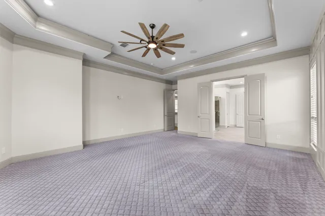 a bathroom with a tub a sink and a mirror