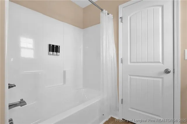 a bathroom with a bathtub