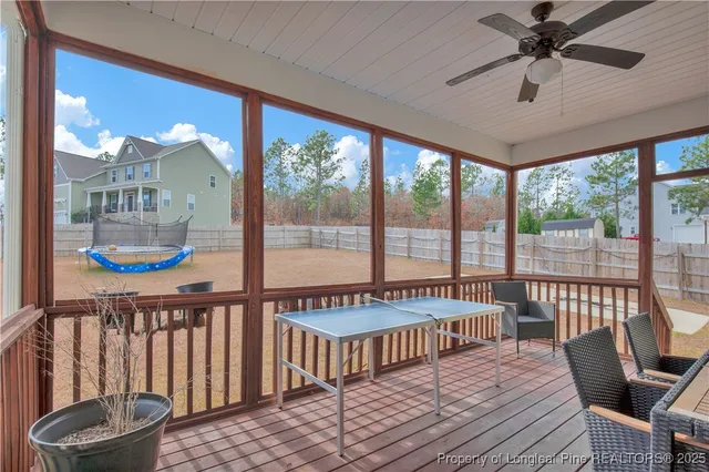a view of a balcony with furniture