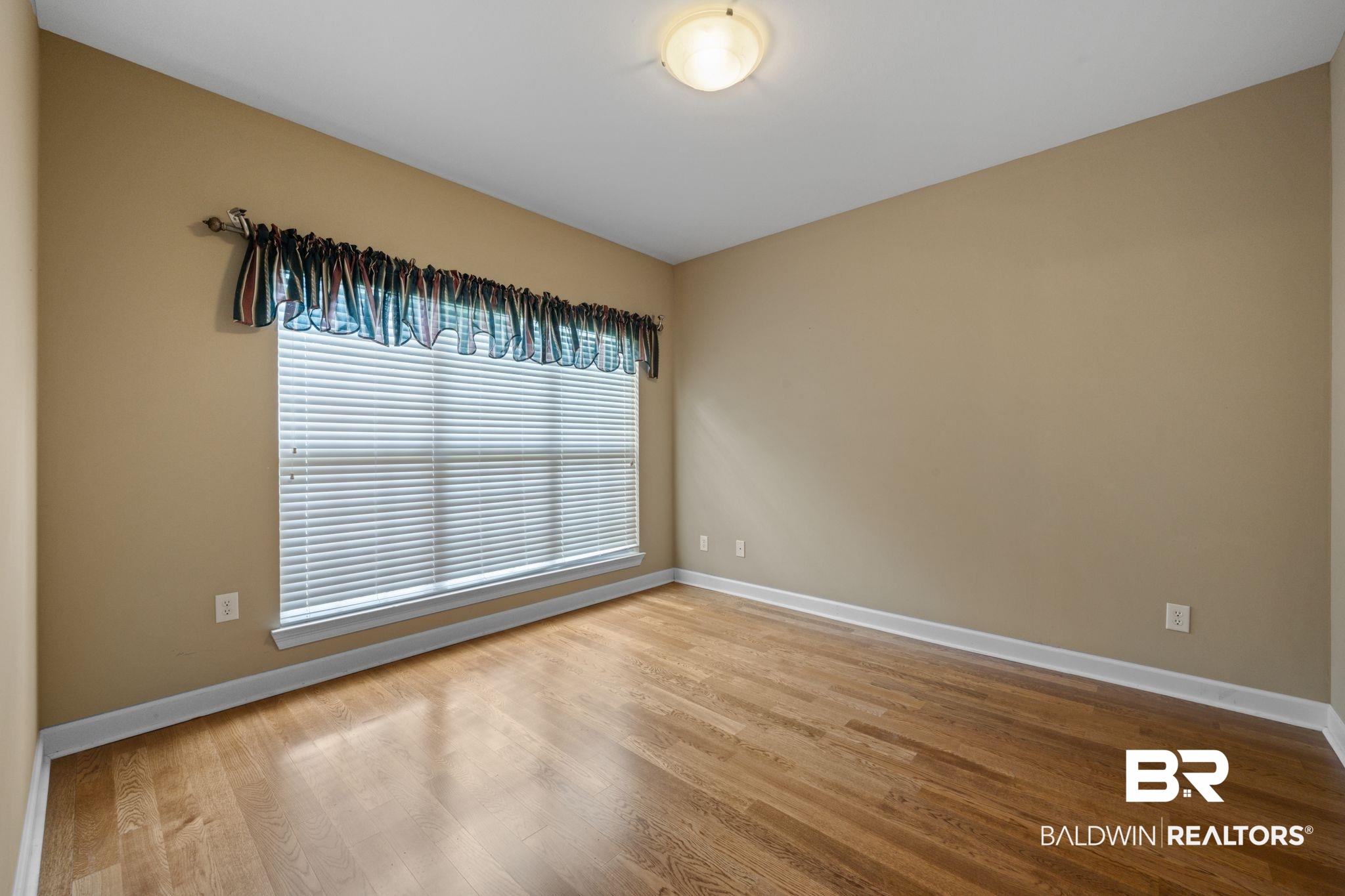 5618 Leytham Road Theodore, AL 36582 - Photo 35 of 60 Empty room with wood-type flooring