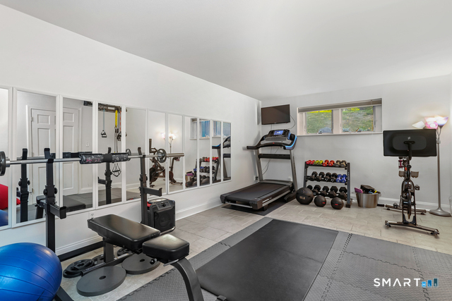 1 Angora Road Westport, CT 06880 - Photo 29 of 39 a view of a room with gym equipment
