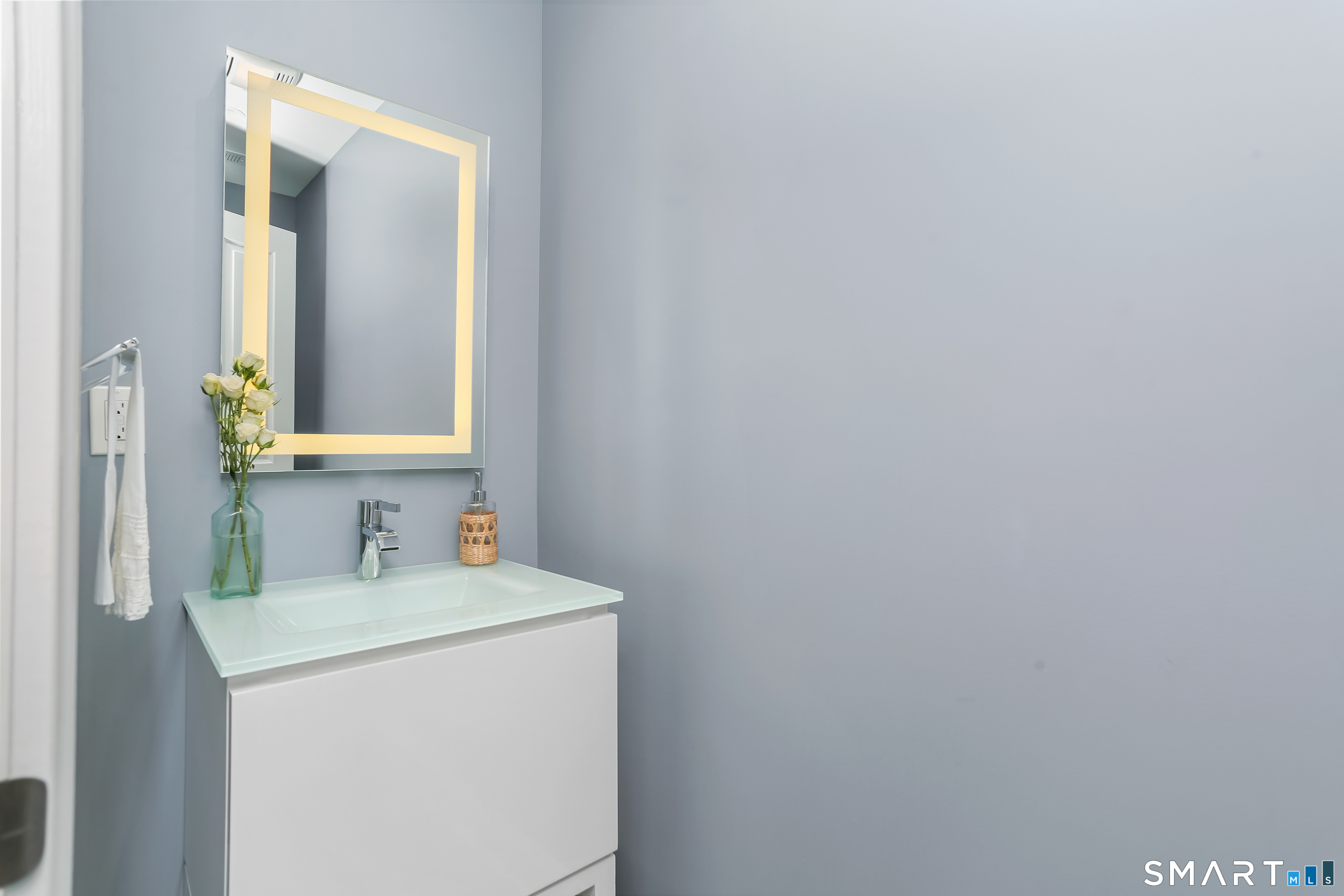 1 Angora Road Westport, CT 06880 - Photo 33 of 39 a bathroom with a sink and a mirror