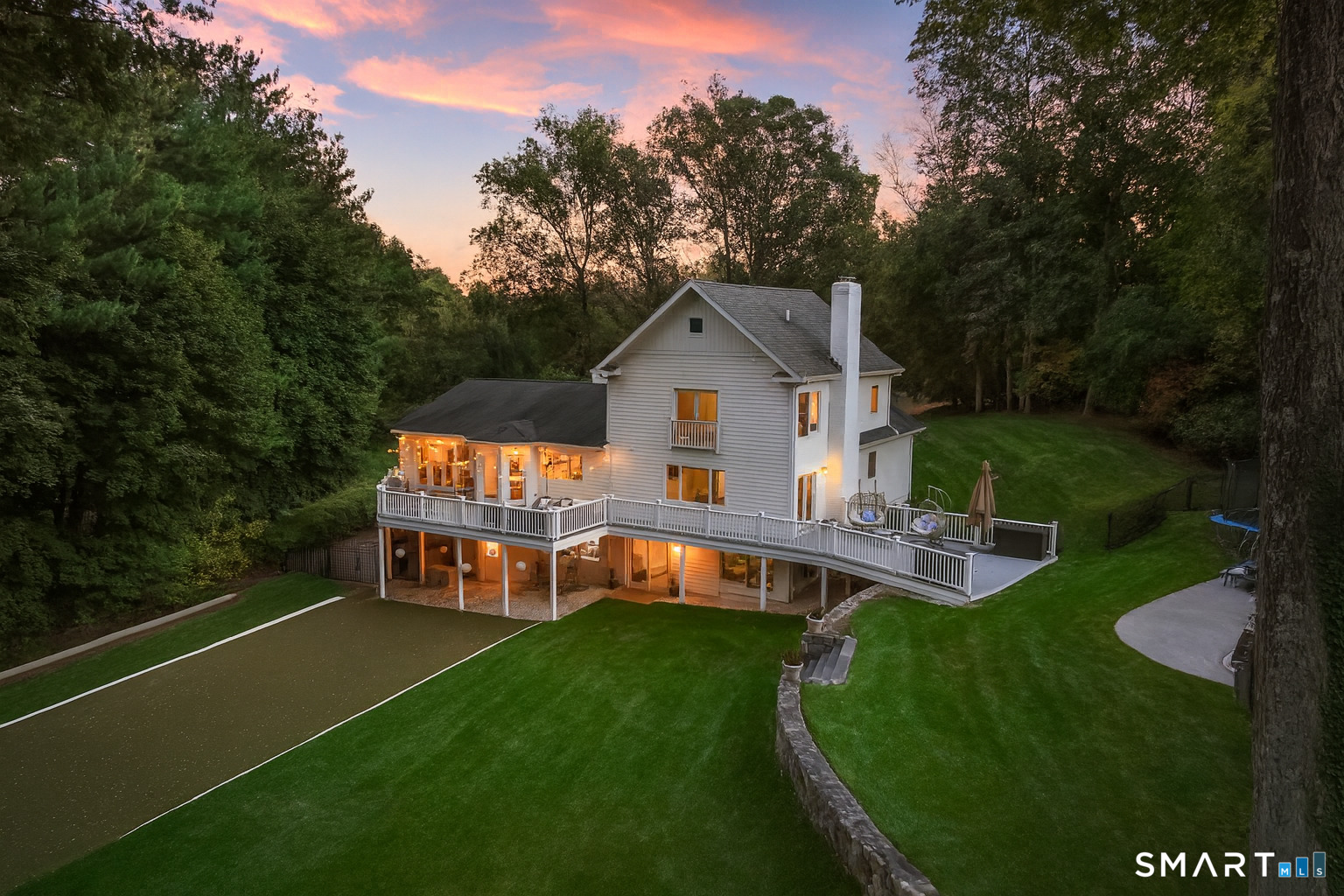 1 Angora Road Westport, CT 06880 - Photo 37 of 39 a view of a house with a yard deck and a slide