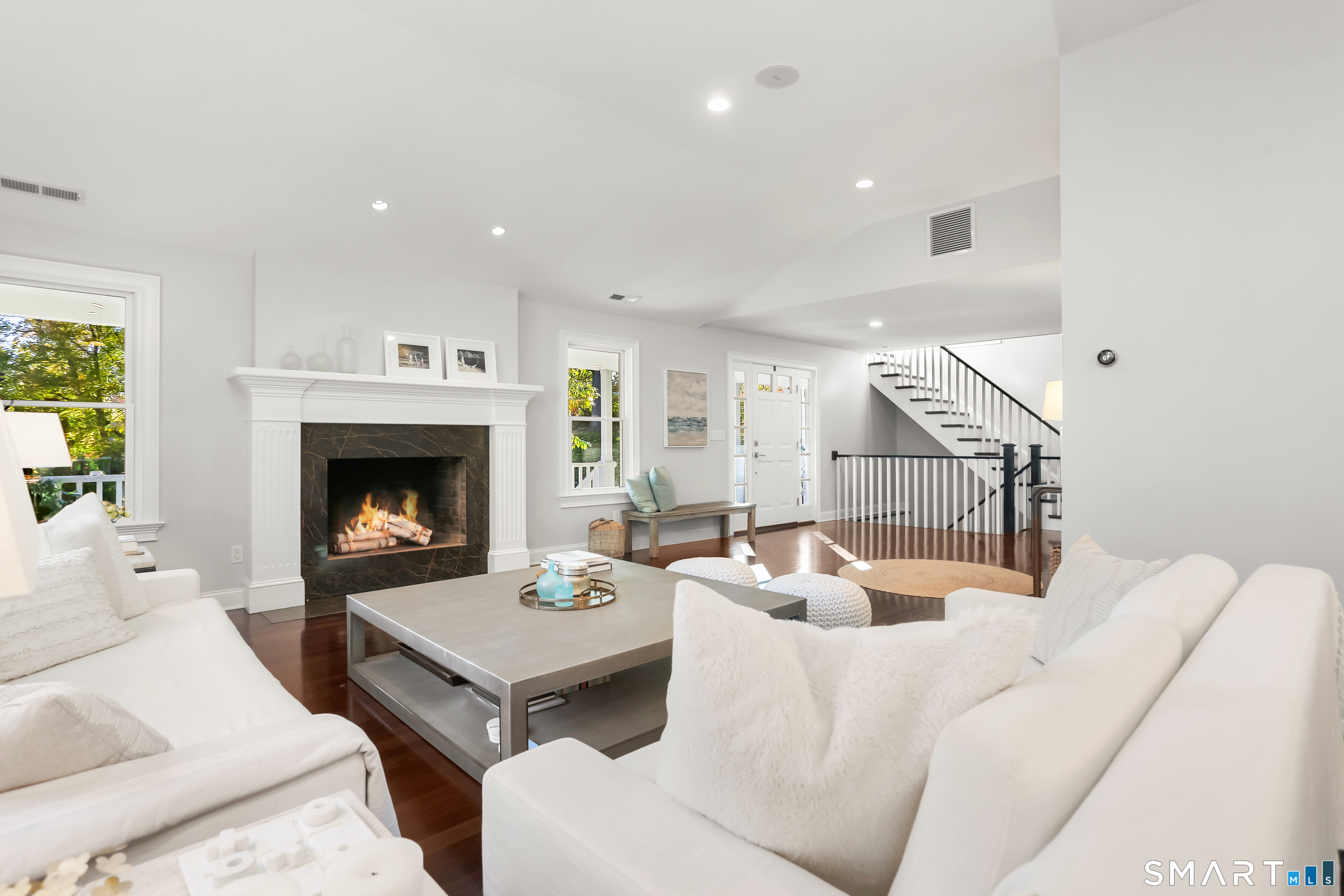 1 Angora Road Westport, CT 06880 - Photo 7 of 39 a living room with furniture and a fireplace