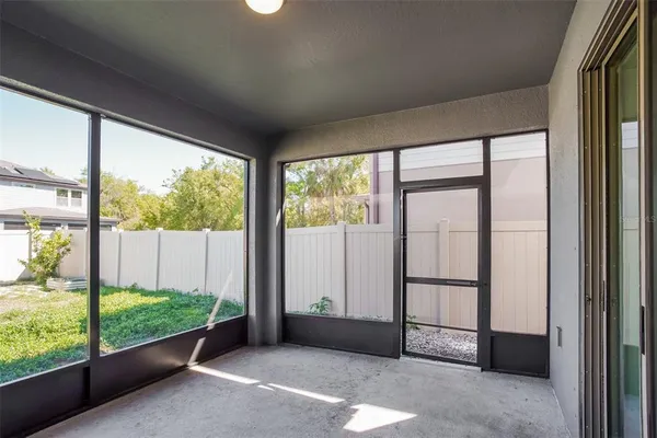 a view of a room with large windows