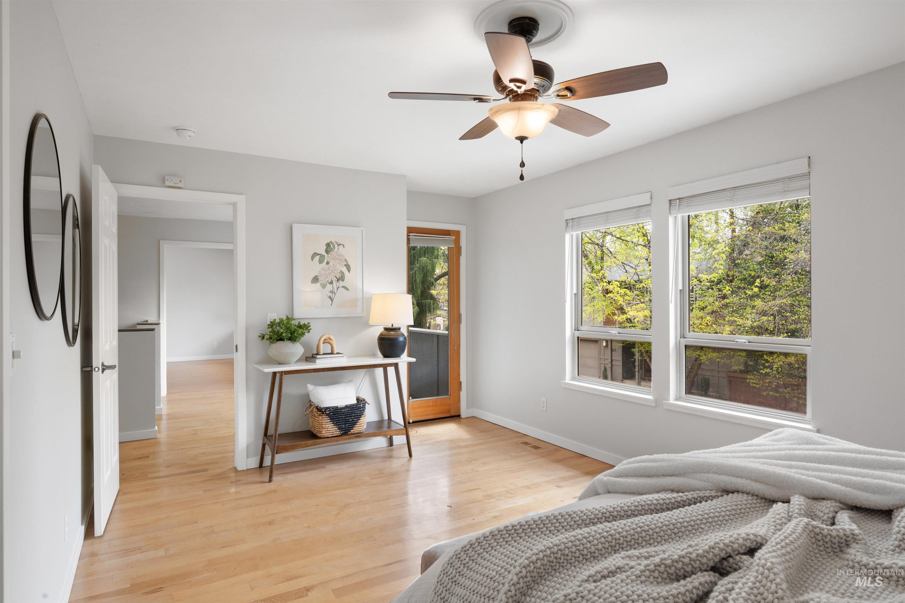 1313 Martin Street Boise, ID 83706 - Photo 12 of 46 Bedroom with light wood finished floors and ceiling fan