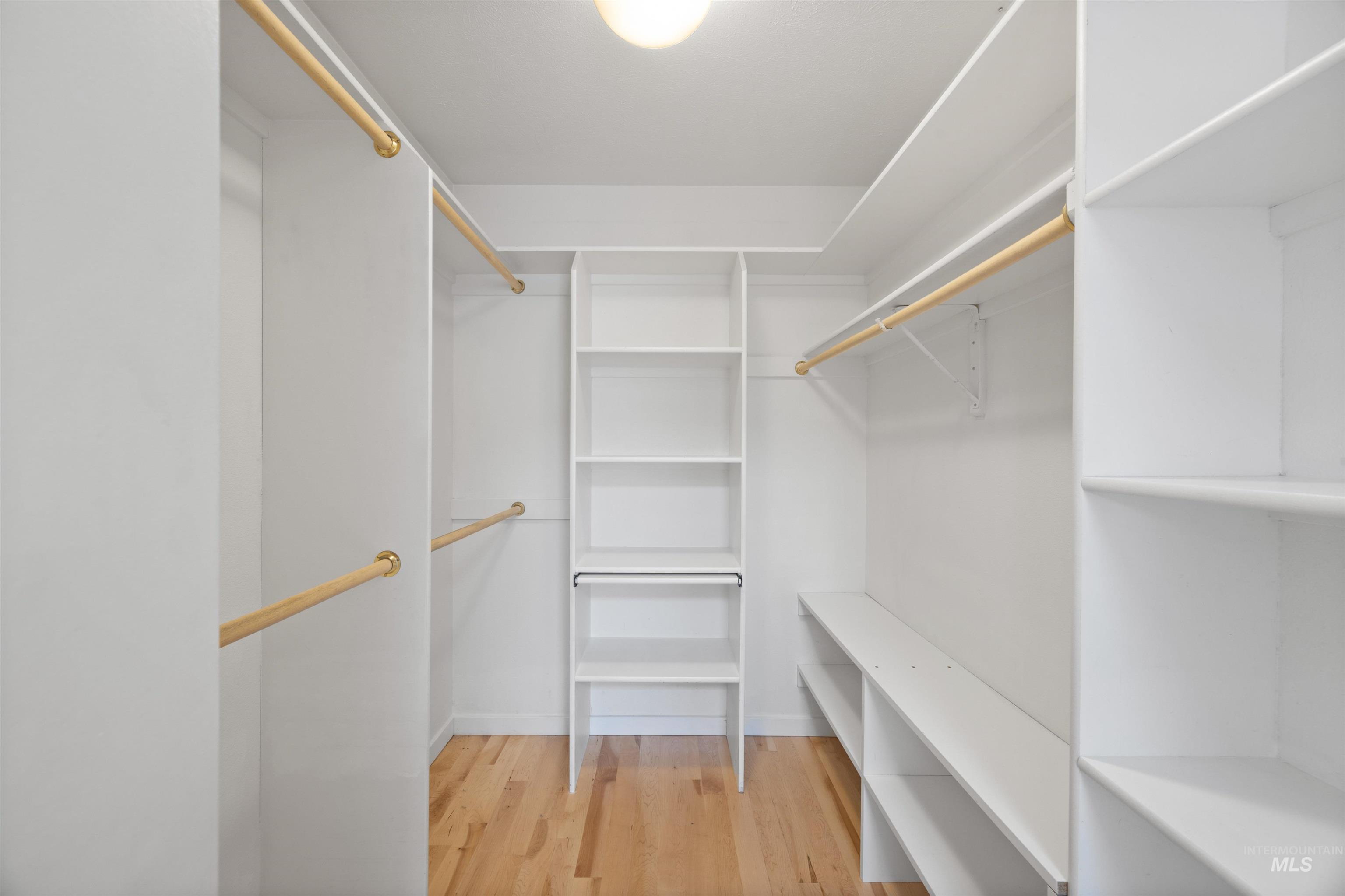 1313 Martin Street Boise, ID 83706 - Photo 15 of 46 Walk in closet featuring light wood finished floors