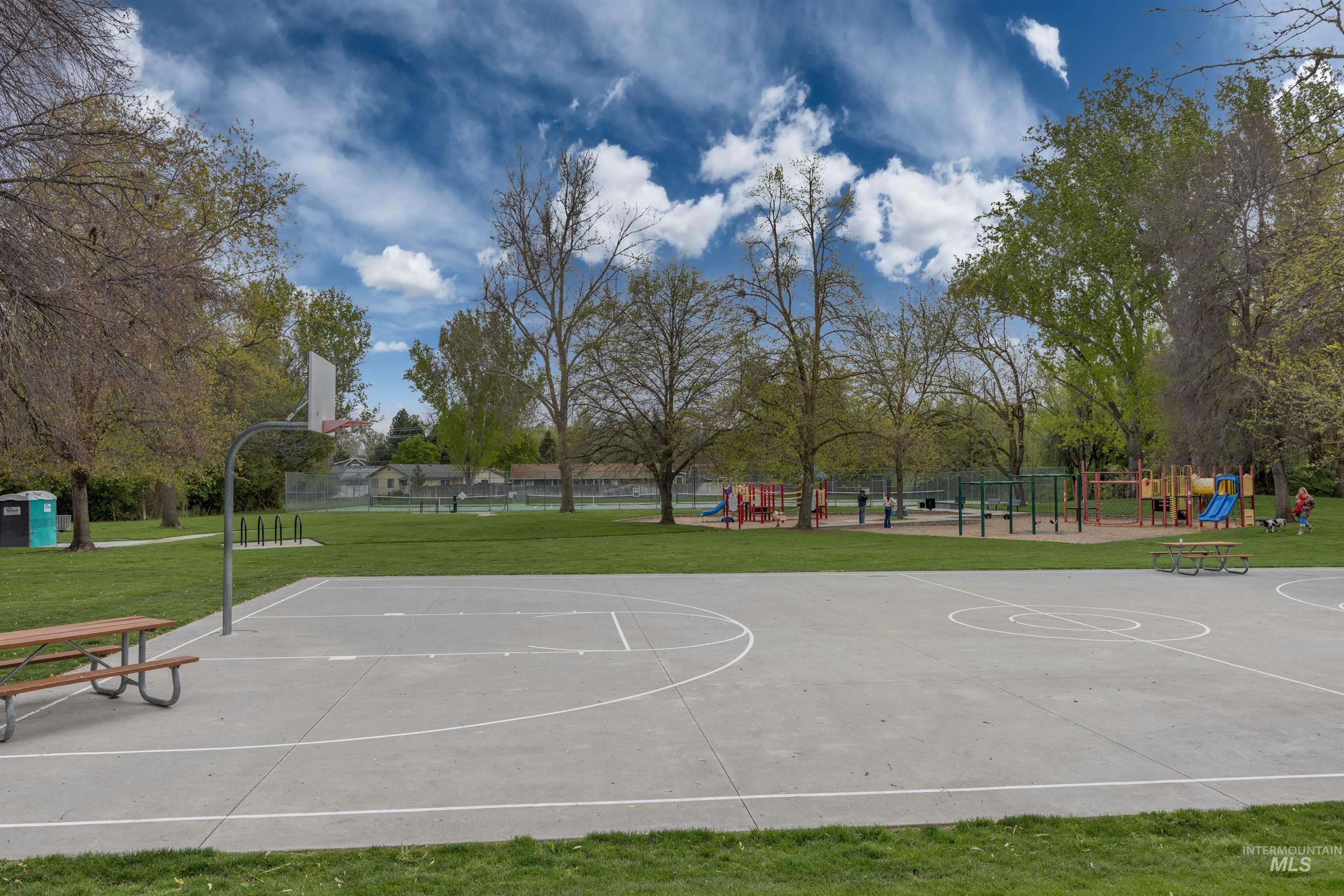 1313 Martin Street Boise, ID 83706 - Photo 18 of 46 View of sport court featuring community basketball court and a lawn