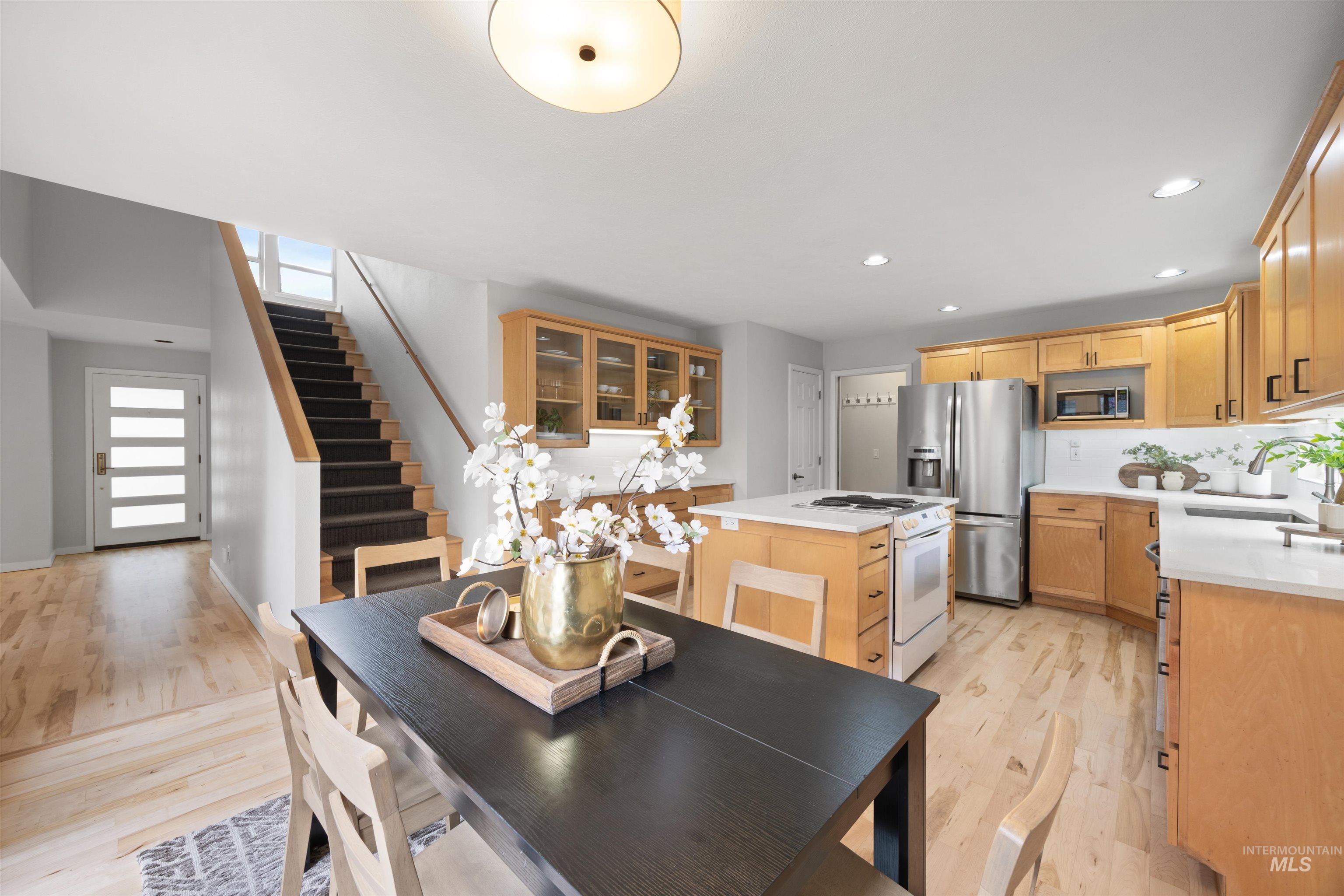 1313 Martin Street Boise, ID 83706 - Photo 29 of 46 Dining area with recessed lighting and light wood-type flooring