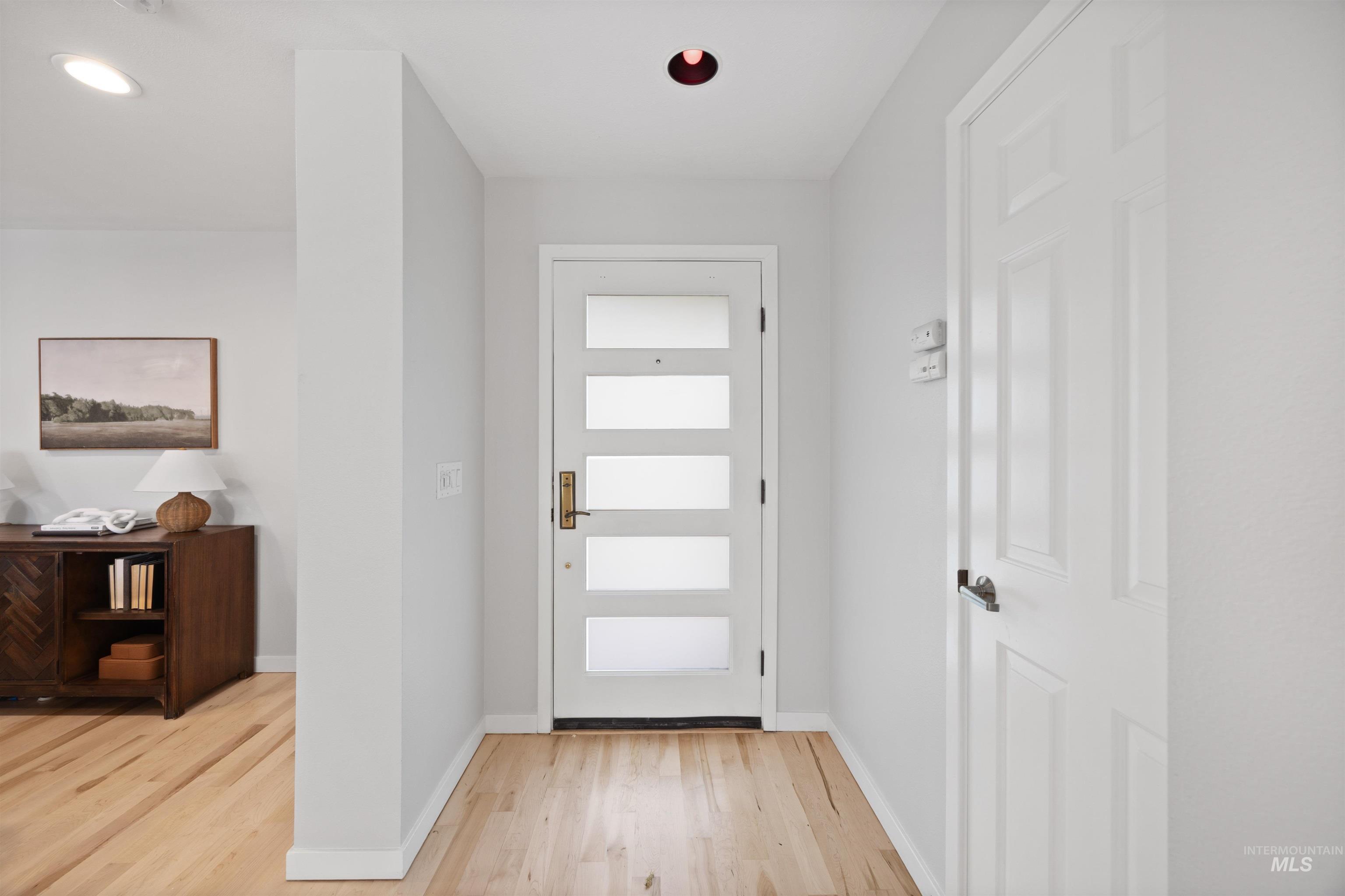 1313 Martin Street Boise, ID 83706 - Photo 3 of 46 Foyer entrance with light wood finished floors and recessed lighting