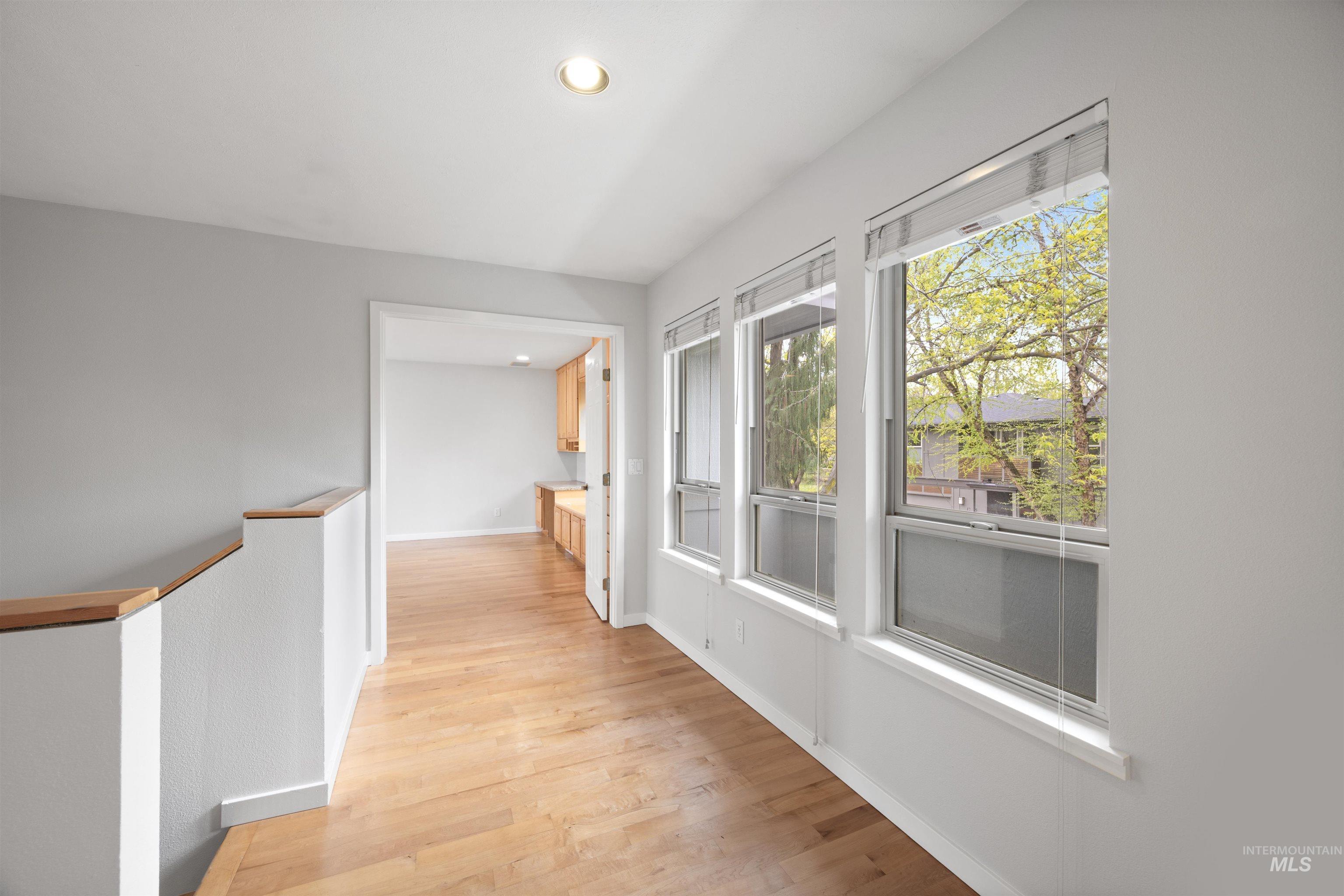 1313 Martin Street Boise, ID 83706 - Photo 32 of 46 Corridor with recessed lighting and light wood-style flooring